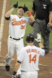 Luke Scott pointing to the sky