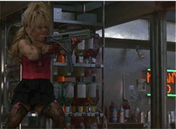 Midget firing machine gun gif